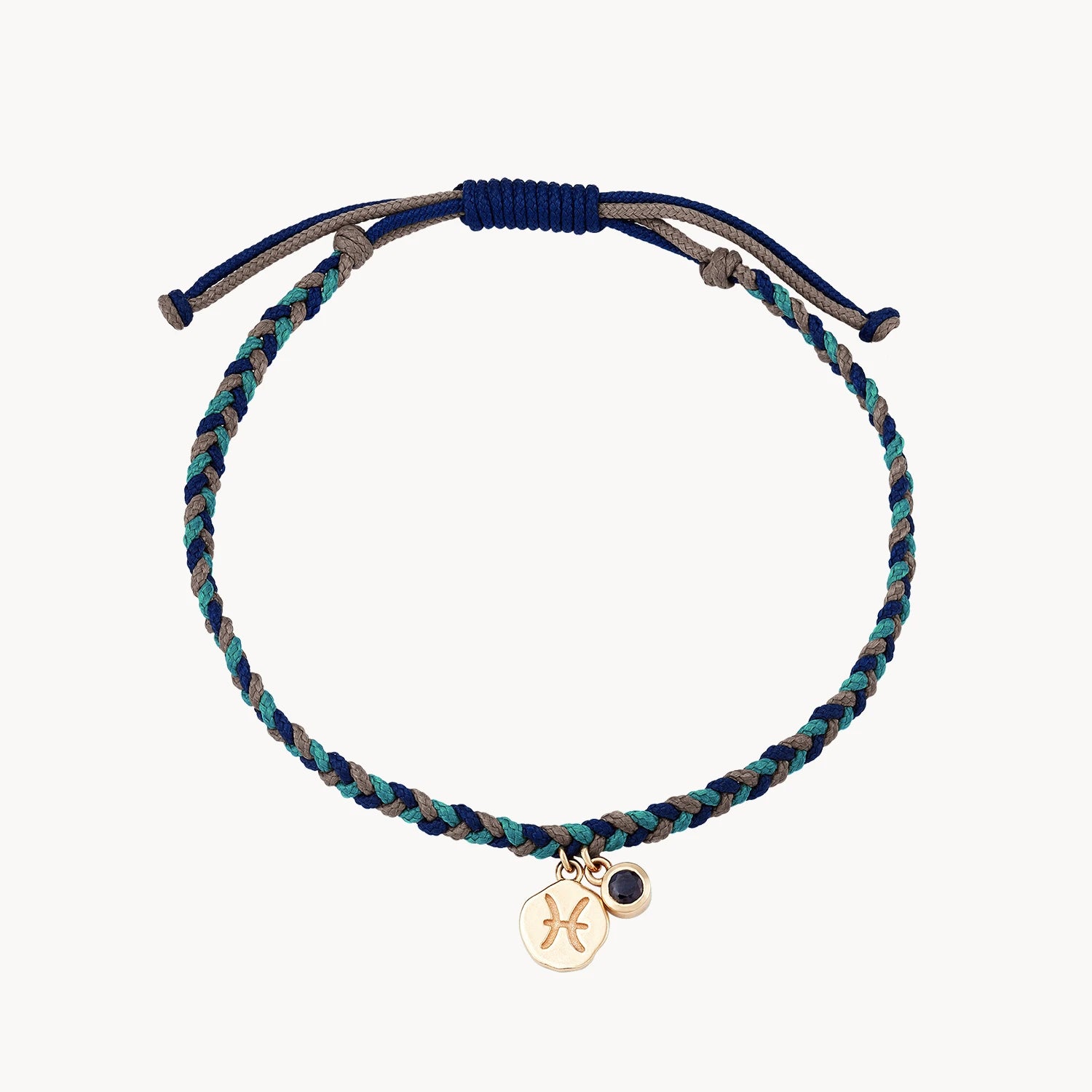 Scratched finish bracelet-pisces zodiac water element cord bracelet - 10k yellow gold, blue sapphire, cord