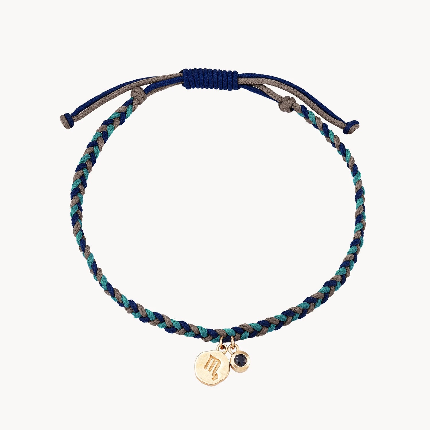 Cracked rind bracelet-scorpio zodiac water element cord bracelet - 10k yellow gold, blue sapphire, cord