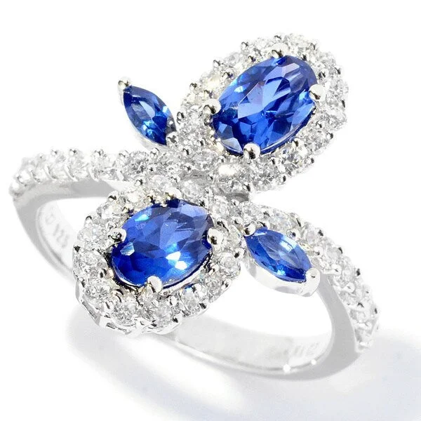 Iron toned ring-Platinum over Silver Blue and White Cubic Zirconia Flower Ring