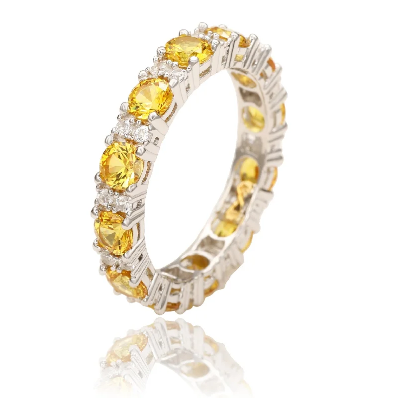 Ragged rim ring-Suzy Levian Sterling Silver Round Cut Yellow Sapphire and Diamond Accent Eternity Band