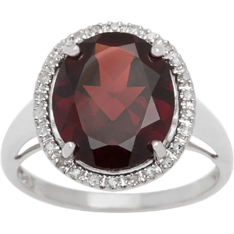 Faceted cut ring-Viducci 10k Gold Oval Garnet and 1/6ct TDW Diamond Halo Ring (G-H, I1-I2)